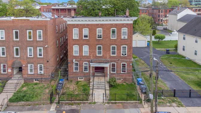 Exterior, Facade, Brick Facade, Rowhouse