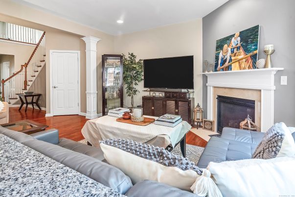 Fireplace, Interior, Living room, Recessed Lighting, Wood Texture Flooring
