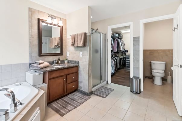 Bathroom, Dual Sink Vanities, Interior, Recessed Lighting, Wood Texture Flooring