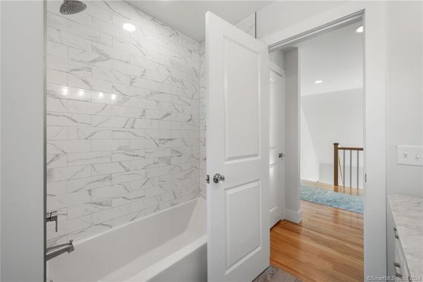 Bathroom, Interior, Marble Walls, Recessed Lighting, Wood Texture Flooring