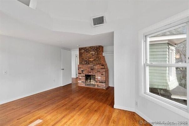 Empty room, Fireplace, Interior, Stone Walls, Wood Texture Flooring
