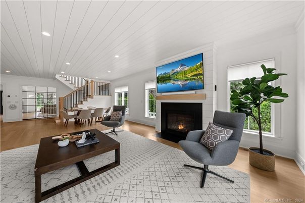 Dining room, Fireplace, Interior, Living room, Pendant Lights, Recessed Lighting, Wood Texture Flooring