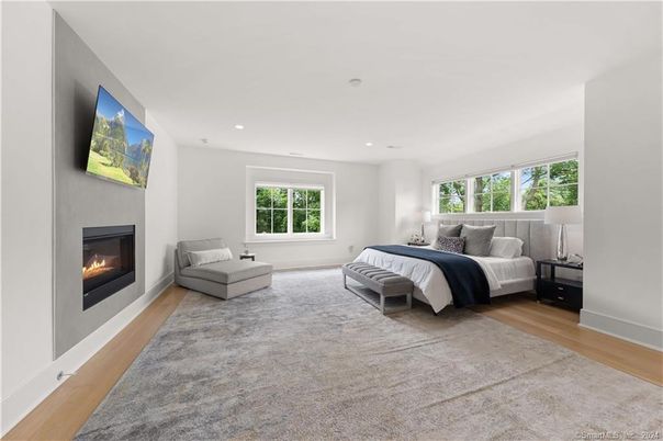 Bedroom, Fireplace, Interior, Recessed Lighting, Wood Texture Flooring