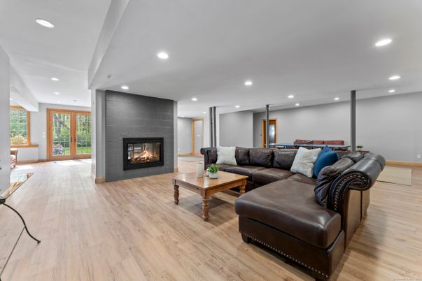 Fireplace, Interior, Living room, Recessed Lighting, Wood Texture Flooring