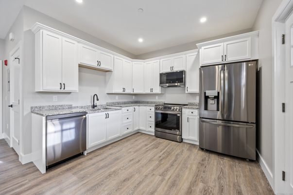 Interior, Kitchen, Recessed Lighting, Stainless Steel Appliances, Wood Texture Flooring