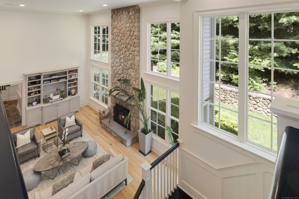 Fireplace, Interior, Living room, Recessed Lighting, Stone Walls, Wood Texture Flooring