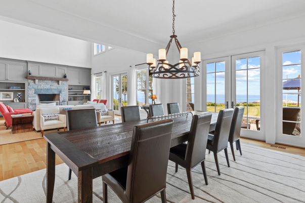Chandelier, Dining room, Fireplace, Interior, Living room, Pendant Lights, Water, Wood Texture Flooring
