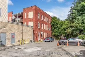 Exterior, Facade, Brick Facade, Condo Building