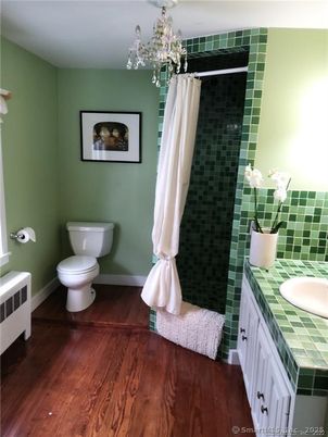 Bathroom, Chandelier, Interior, Tile Countertops, Wood Texture Flooring