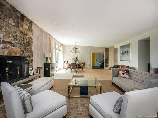 Chandelier, Dining room, Fireplace, Interior, Living room, Stone Walls