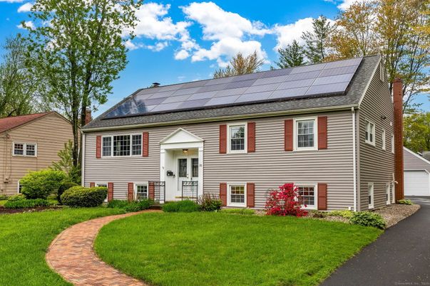 Exterior, Facade, Solar Panels, Raised Ranch