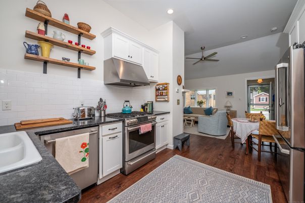 Dining room, Interior, Kitchen, Living room, Recessed Lighting, Stainless Steel Appliances, Wood Texture Flooring