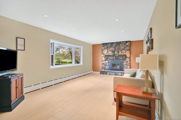 Fireplace, Interior, Recessed Lighting, Stone Walls, Wood Texture Flooring