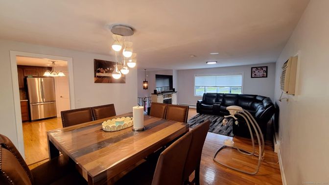 Dining room, Interior, Kitchen, Living room, Pendant Lights, Recessed Lighting, Stainless Steel Appliances, Wood Texture Flooring