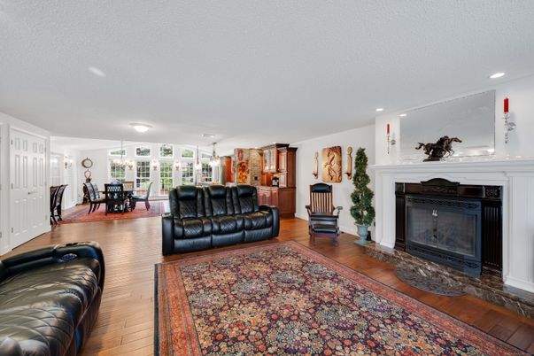 Chandelier, Dining room, Fireplace, Interior, Living room, Recessed Lighting, Wood Texture Flooring