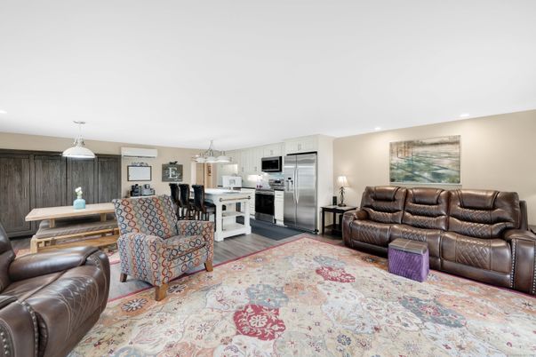 Dining room, Interior, Kitchen, Living room, Pendant Lights, Recessed Lighting, Stainless Steel Appliances, Wood Texture Flooring