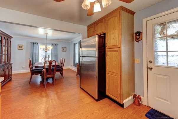 Chandelier, Dining room, Interior, Kitchen, Stainless Steel Appliances, Wood Texture Flooring