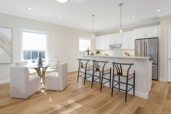 Dining room, Interior, Kitchen, Pendant Lights, Recessed Lighting, Stainless Steel Appliances, Wood Texture Flooring