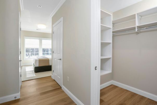 Bedroom, Interior, Recessed Lighting, Walk-in Closets, Wood Texture Flooring