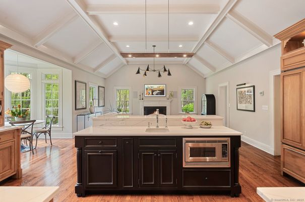 Dining room, Fireplace, Interior, Kitchen, Pendant Lights, Recessed Lighting, Wood Texture Flooring