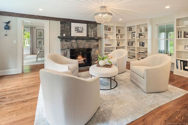 Chandelier, Fireplace, Interior, Living room, Recessed Lighting, Wood Texture Flooring