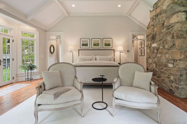 Bedroom, Fireplace, Interior, Recessed Lighting, Stone Walls, Wood Texture Flooring