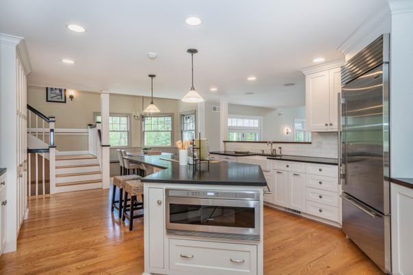 Dining room, Interior, Kitchen, Pendant Lights, Recessed Lighting, Stainless Steel Appliances, Wood Texture Flooring