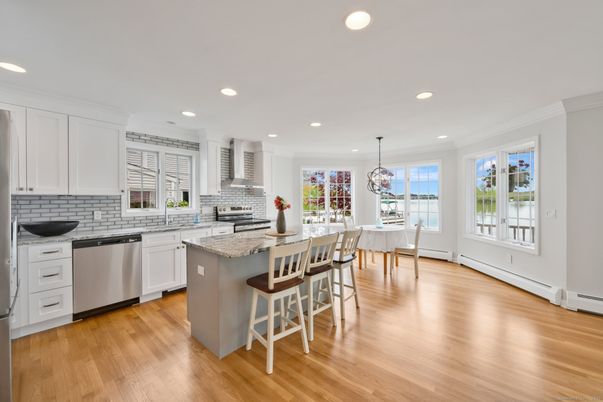 Dining room, Interior, Kitchen, Pendant Lights, Recessed Lighting, Stainless Steel Appliances, Wood Texture Flooring