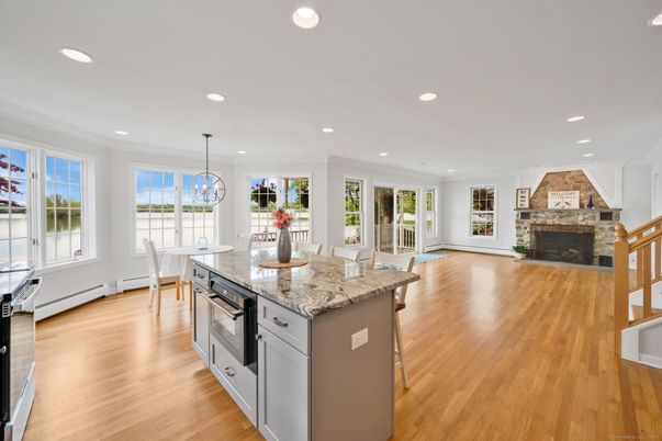Chandelier, Dining room, Fireplace, Interior, Kitchen, Pendant Lights, Recessed Lighting, Wood Texture Flooring