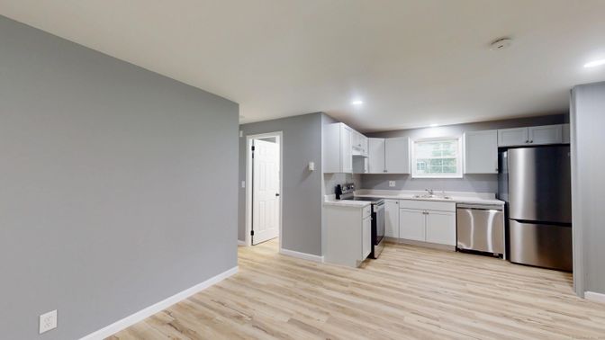 Interior, Kitchen, Recessed Lighting, Stainless Steel Appliances, Wood Texture Flooring