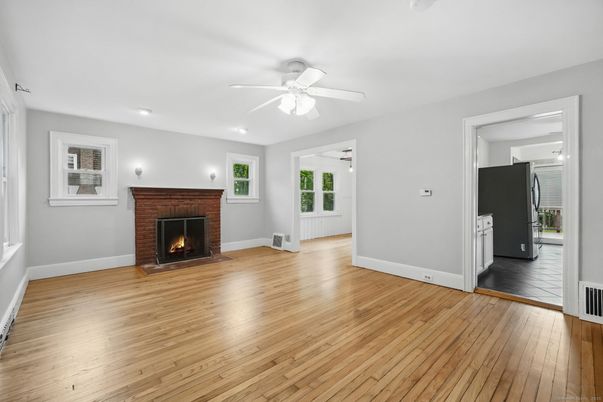 Empty room, Fireplace, Interior, Recessed Lighting, Wood Texture Flooring