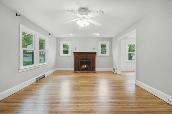 Empty room, Fireplace, Interior, Recessed Lighting, Wood Texture Flooring