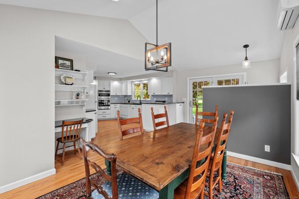 Dining room, Interior, Kitchen, Pendant Lights, Recessed Lighting, Stainless Steel Appliances, Wood Texture Flooring