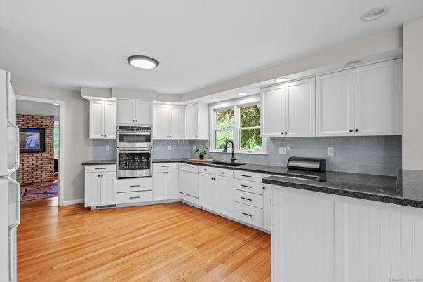 Interior, Kitchen, Recessed Lighting, Stainless Steel Appliances, Wood Texture Flooring