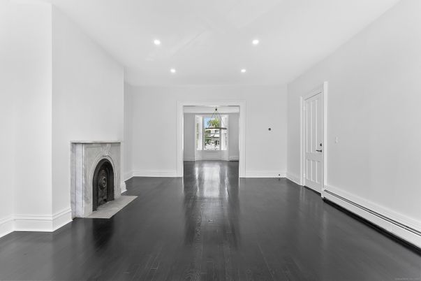Empty room, Fireplace, Interior, Recessed Lighting, Wood Texture Flooring