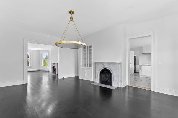 Empty room, Fireplace, Interior, Marble, Pendant Lights, Recessed Lighting, Wood Texture Flooring