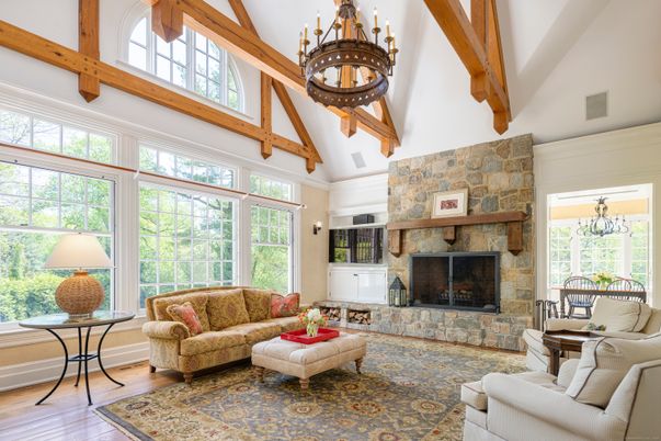 Chandelier, Fireplace, Interior, Living room, Stone Walls, Wooden Beams, Wood Texture Flooring