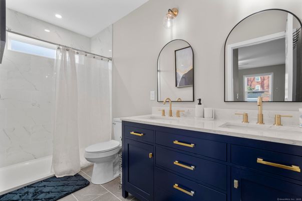 Bathroom, Dual Sink Vanities, Interior, Marble, Marble Walls, Recessed Lighting