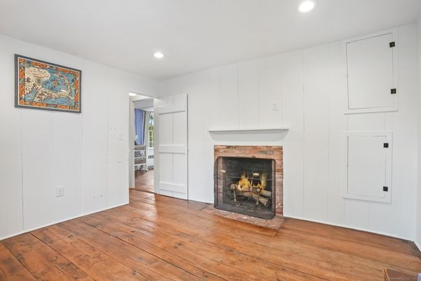 Empty room, Fireplace, Interior, Recessed Lighting, Wood Texture Flooring