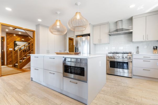 Interior, Kitchen, Pendant Lights, Recessed Lighting, Stainless Steel Appliances, Wood Texture Flooring, Wooden Walls