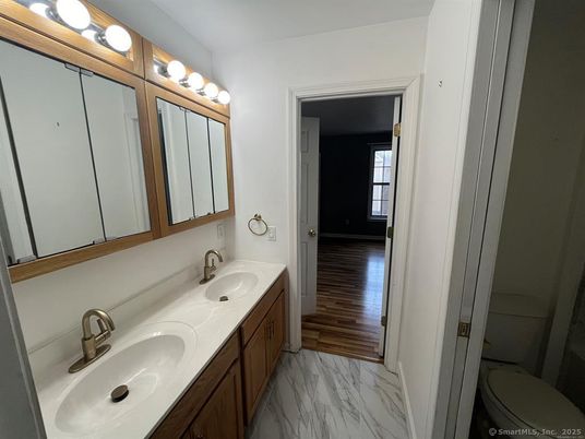 Bathroom, Dual Sink Vanities, Interior, Marble, Wood Texture Flooring