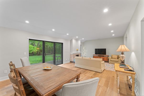 Dining room, Fireplace, Interior, Living room, Recessed Lighting, Wood Texture Flooring