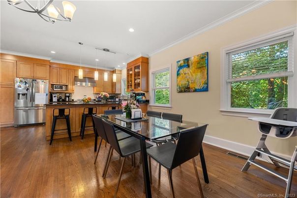 Dining room, Interior, Kitchen, Pendant Lights, Recessed Lighting, Stainless Steel Appliances, Wood Texture Flooring