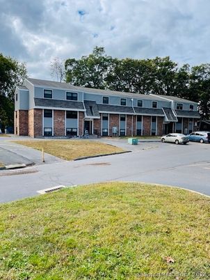 Exterior, Facade, Brick Facade, Condo Building