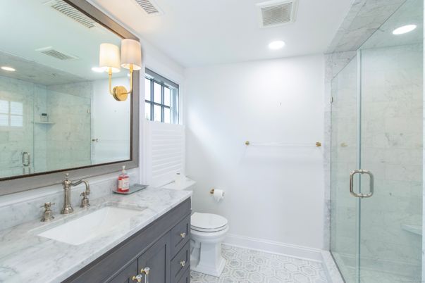 Bathroom, Dual Sink Vanities, Glass Shower, Interior, Marble, Marble Walls, Recessed Lighting