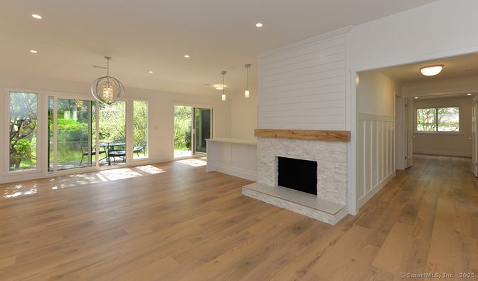 Fireplace, Interior, Pendant Lights, Recessed Lighting, Wood Texture Flooring