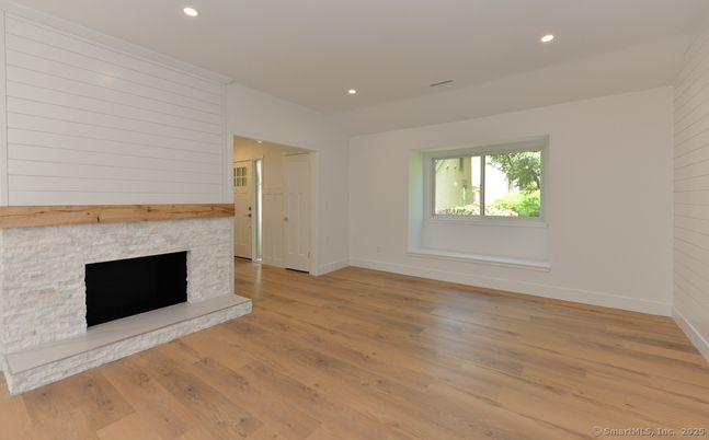Empty room, Fireplace, Interior, Recessed Lighting, Wood Texture Flooring