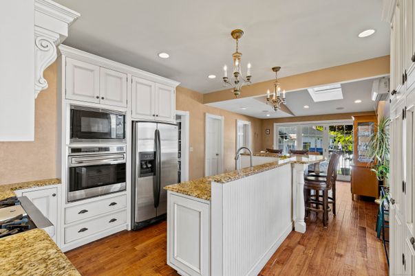 Chandelier, Interior, Kitchen, Recessed Lighting, Stainless Steel Appliances, Wood Texture Flooring