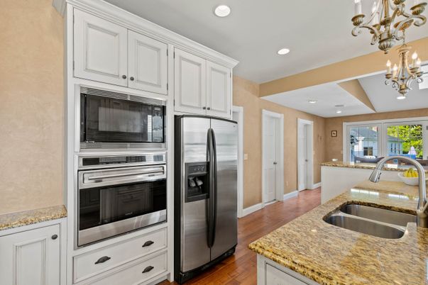 Chandelier, Interior, Kitchen, Recessed Lighting, Stainless Steel Appliances, Wood Texture Flooring