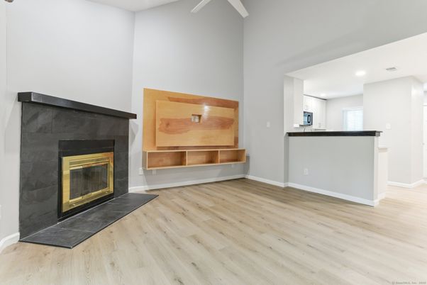 Fireplace, Interior, Recessed Lighting, Wood Texture Flooring